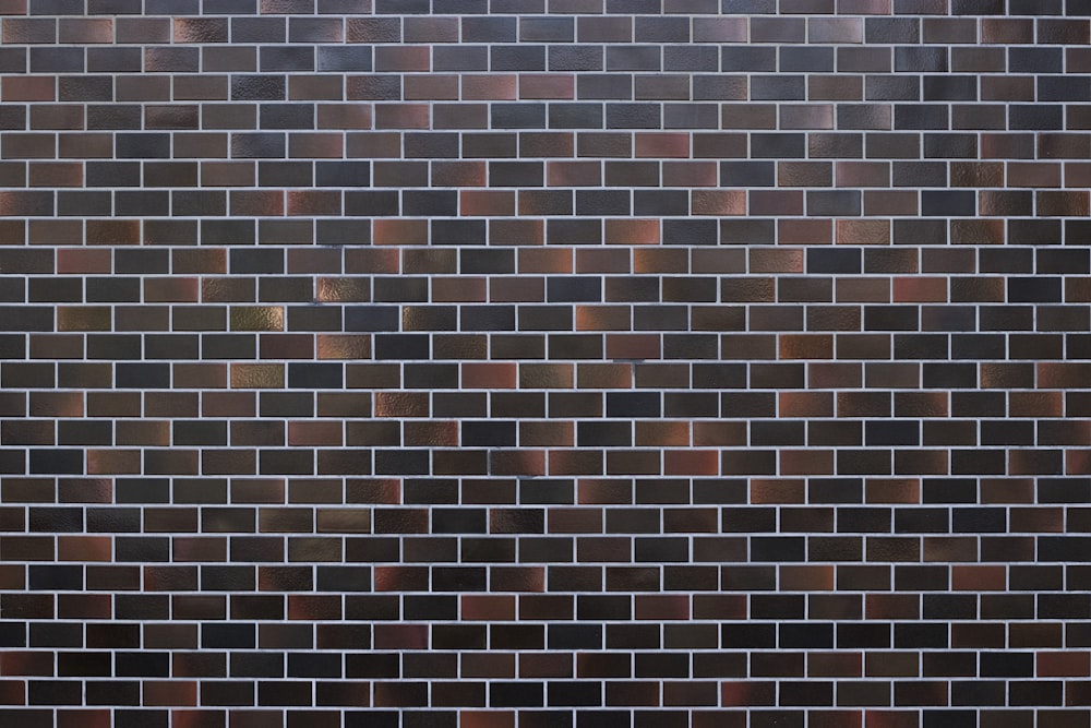 brown and black concrete brick wall