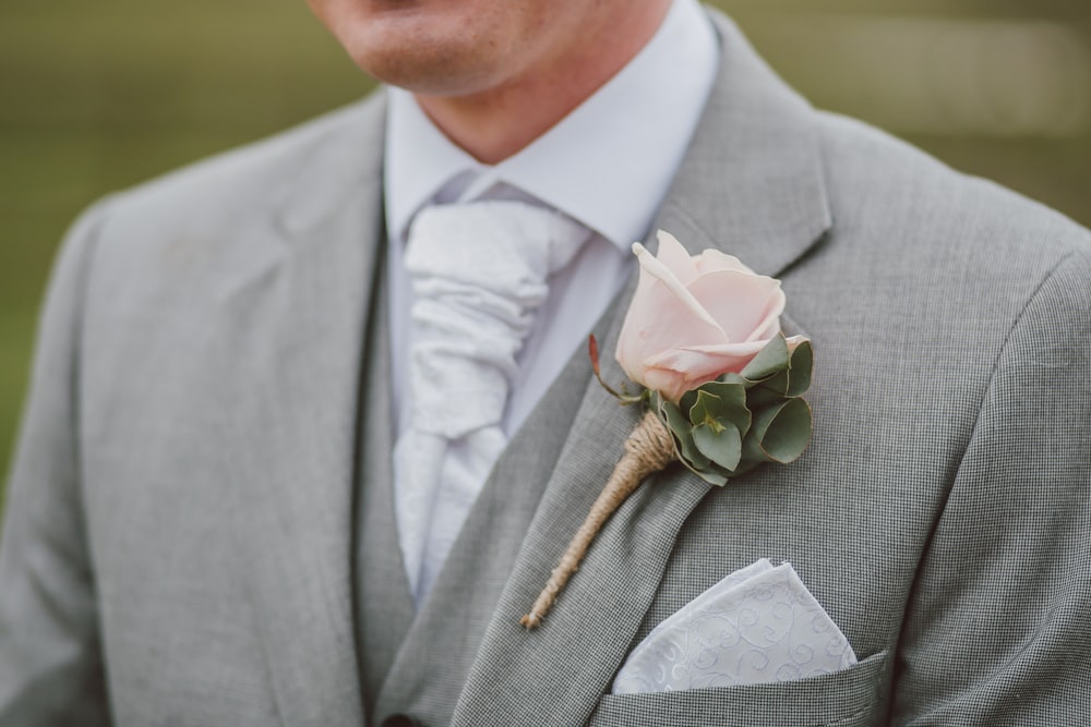 man wearing gray blazer