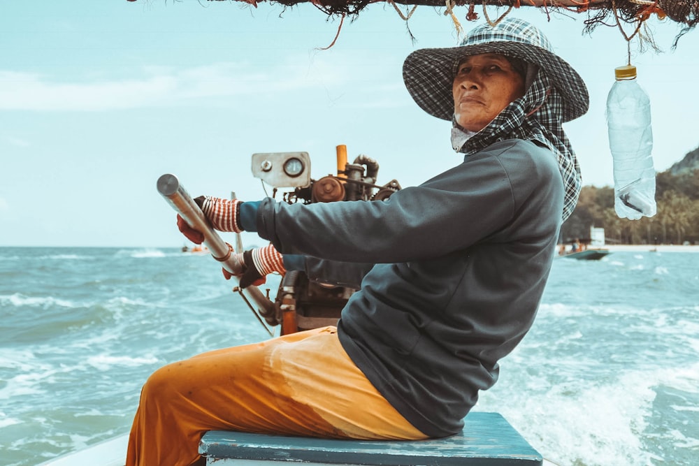 person paddling boat during daytime