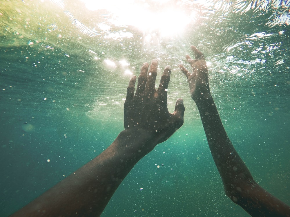 two persons underwater