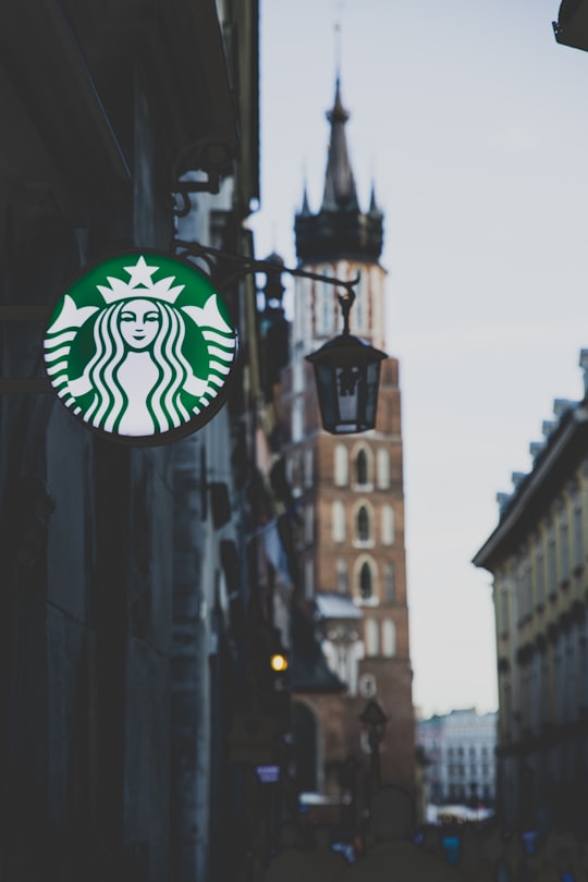 Starbucks neon sign on wall in Florian Street Poland