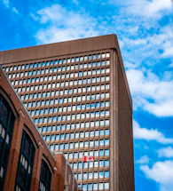 A welcoming office entrance in Toronto with the CN Tower visible through the window.