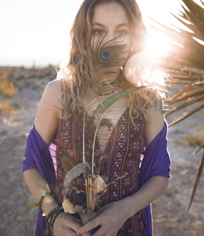 person holding flower vase