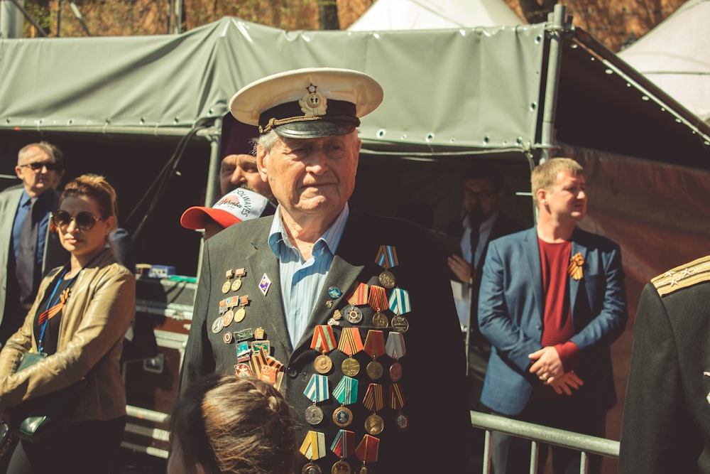 man standing near tent