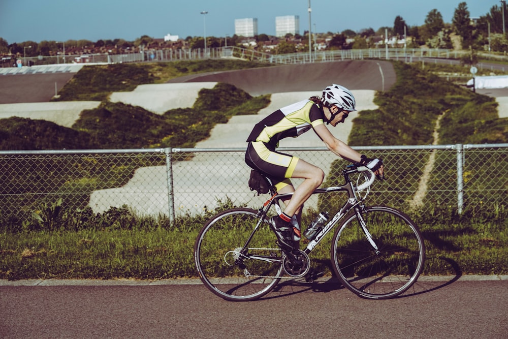 person riding a road bike