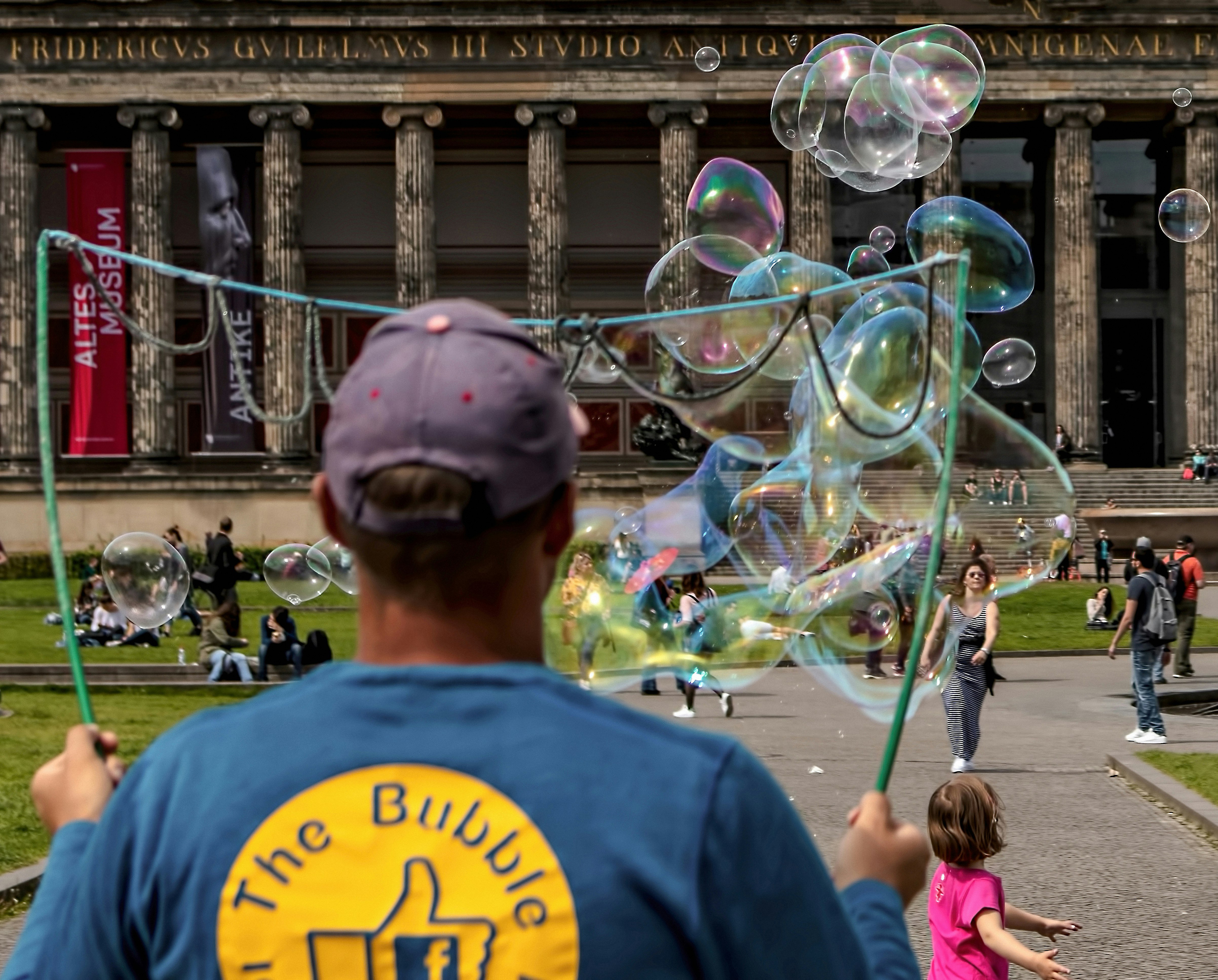 people playing near museum during daytime