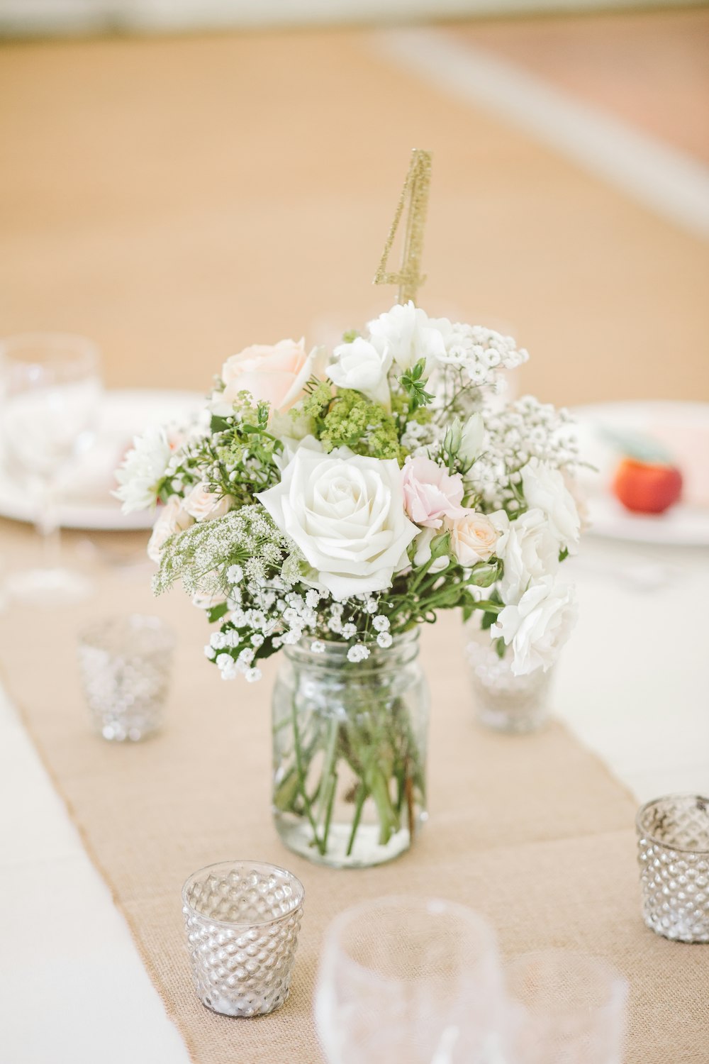 white roses in vase