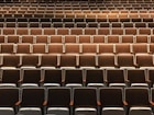 empty brown theater chairs