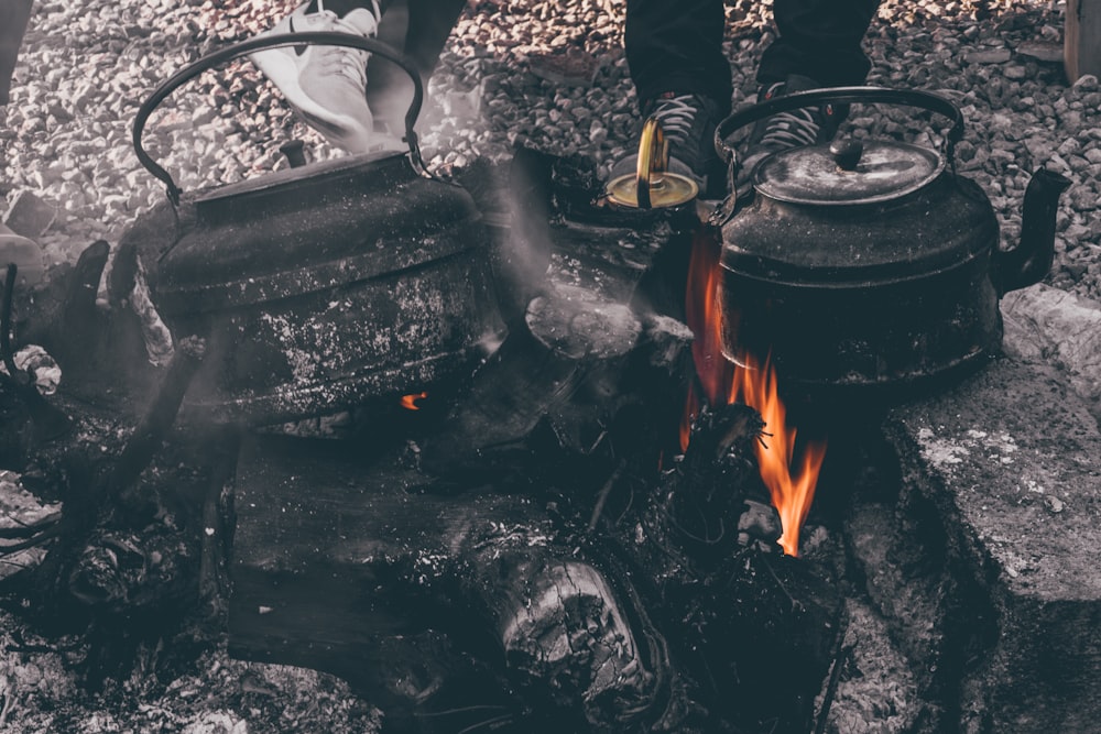 kettle on top of burning woods