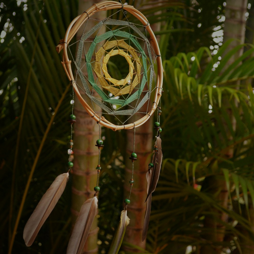 round brown and green haniging dreamcatcher