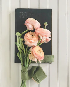 An elegant vintage book cover with romantic floral designs.