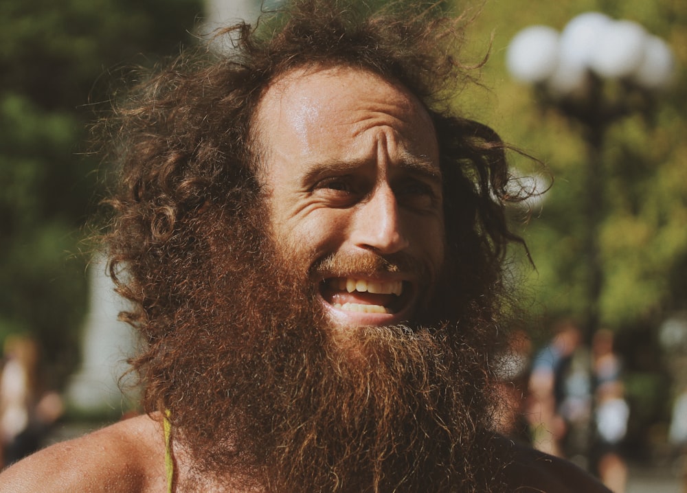 photo of man wearing beard and mustache