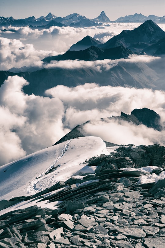 photo of mountain covered with clouds in Cogne Italy