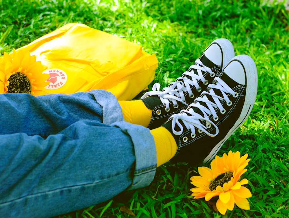 person sitting on grass field