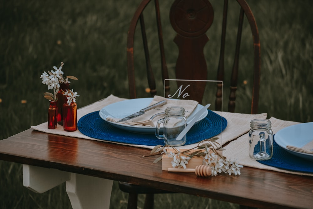 round ceramic table with silver spoon and fork