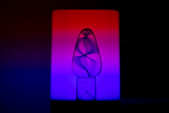 Abstract data visualization resembling a neural network glowing softly on a dark background.