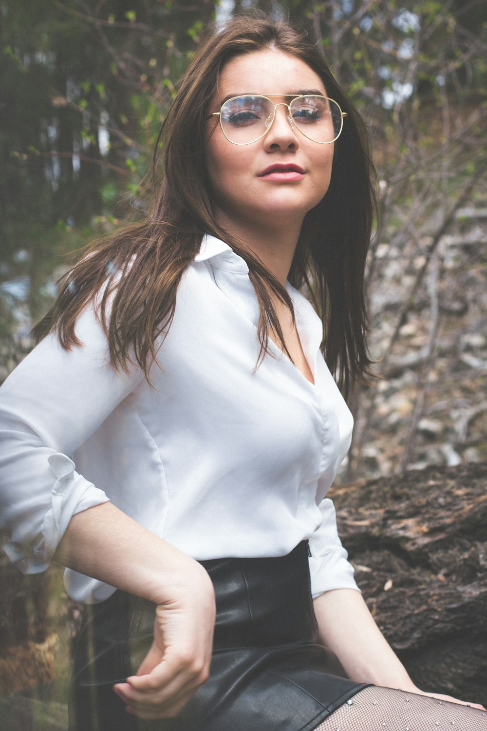 woman wearing white dress shirt and black skirt