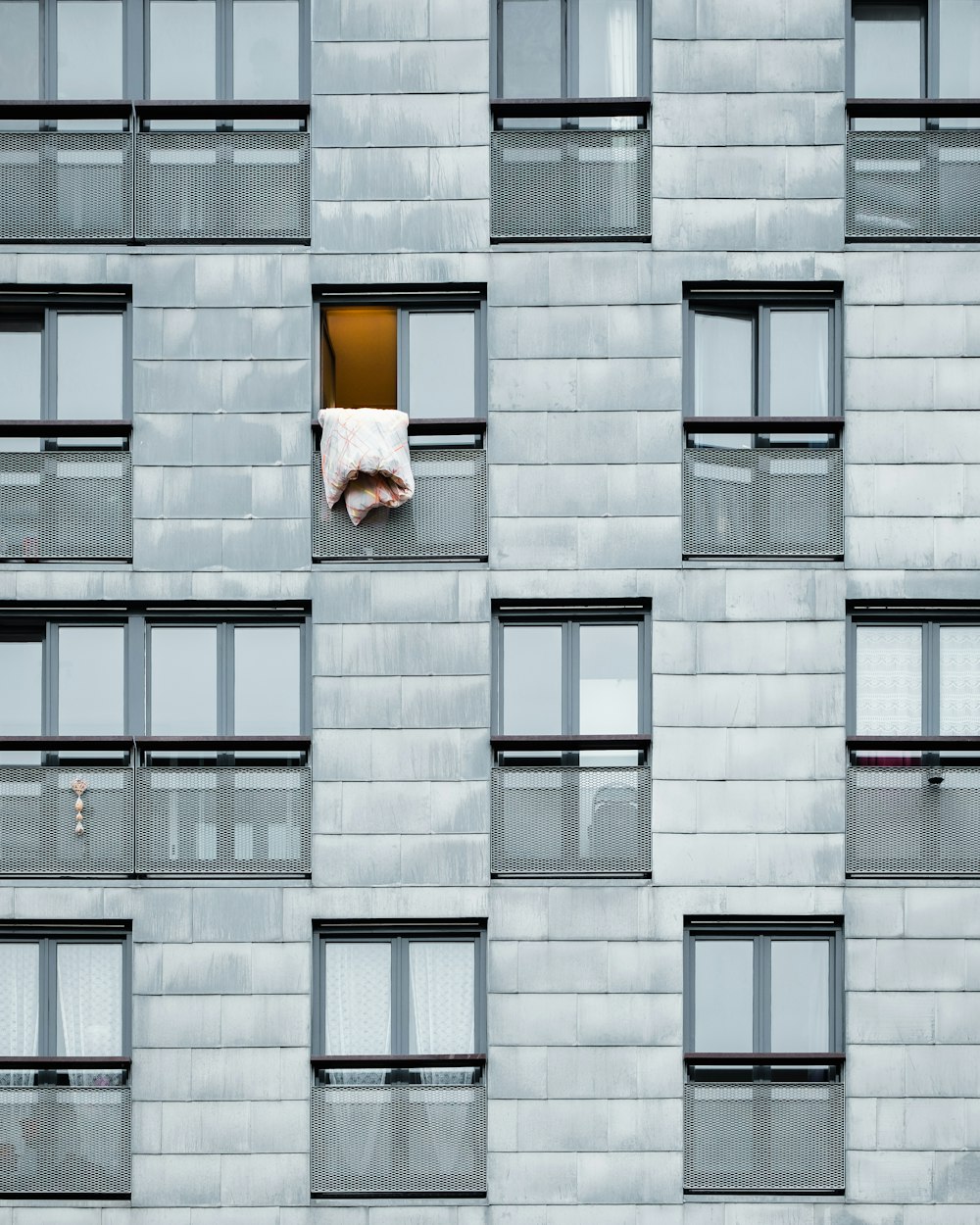 architectural photography of gray condominium building