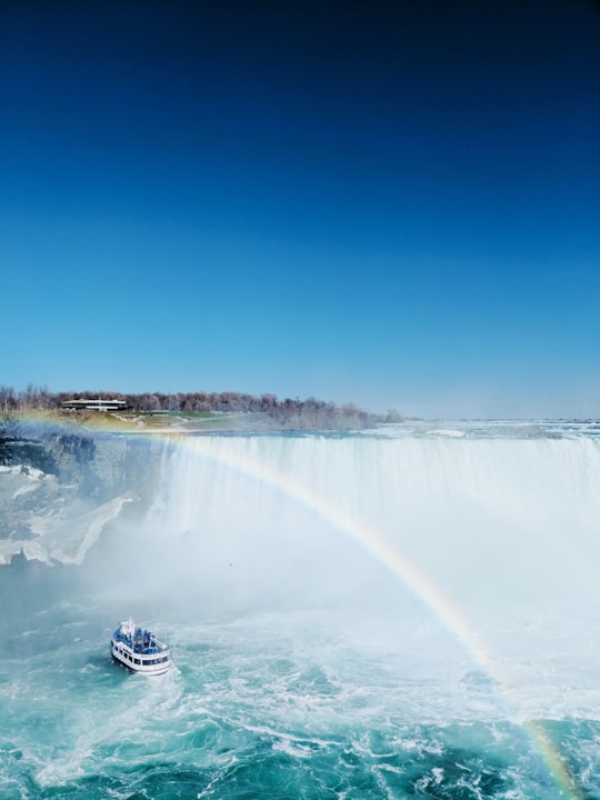 aerial photography of passenger boat in Journey Behind the Falls Canada