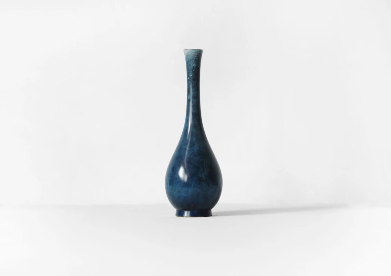 Blue ceramic vessel on a simple background