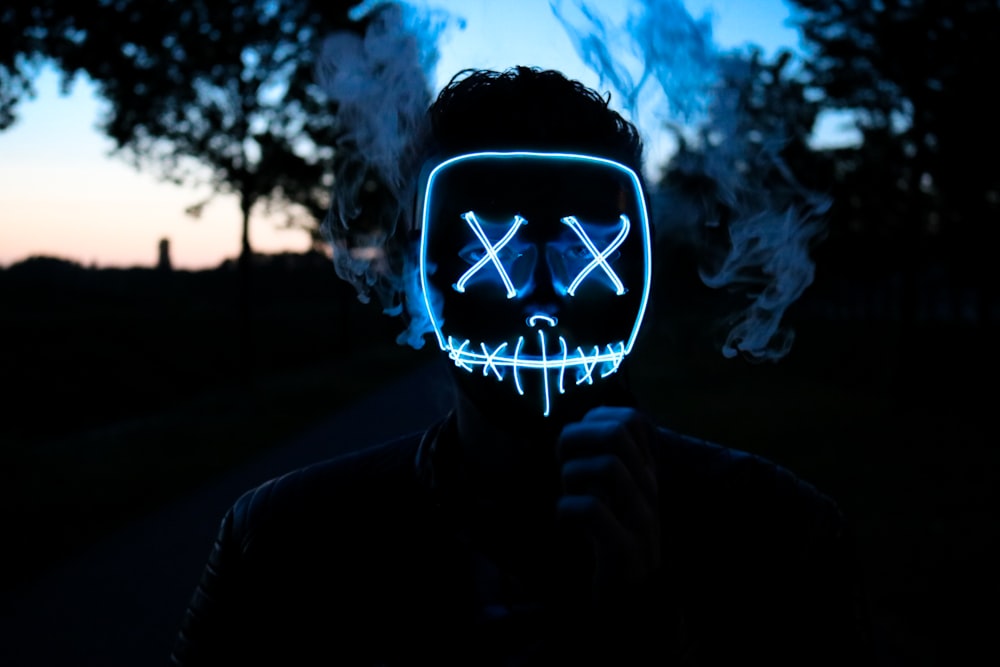man wearing LED mask