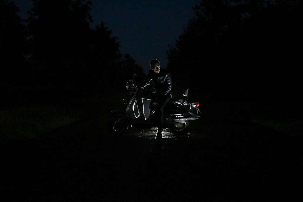 man riding on motorcycle