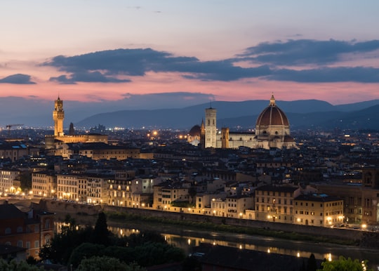 city building during night time in Florence Italy