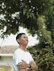 men wearing white shirt near trees