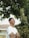 men wearing white shirt near trees