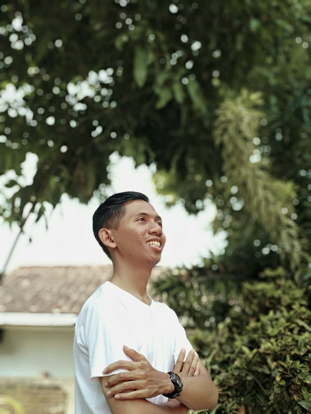 men wearing white shirt near trees