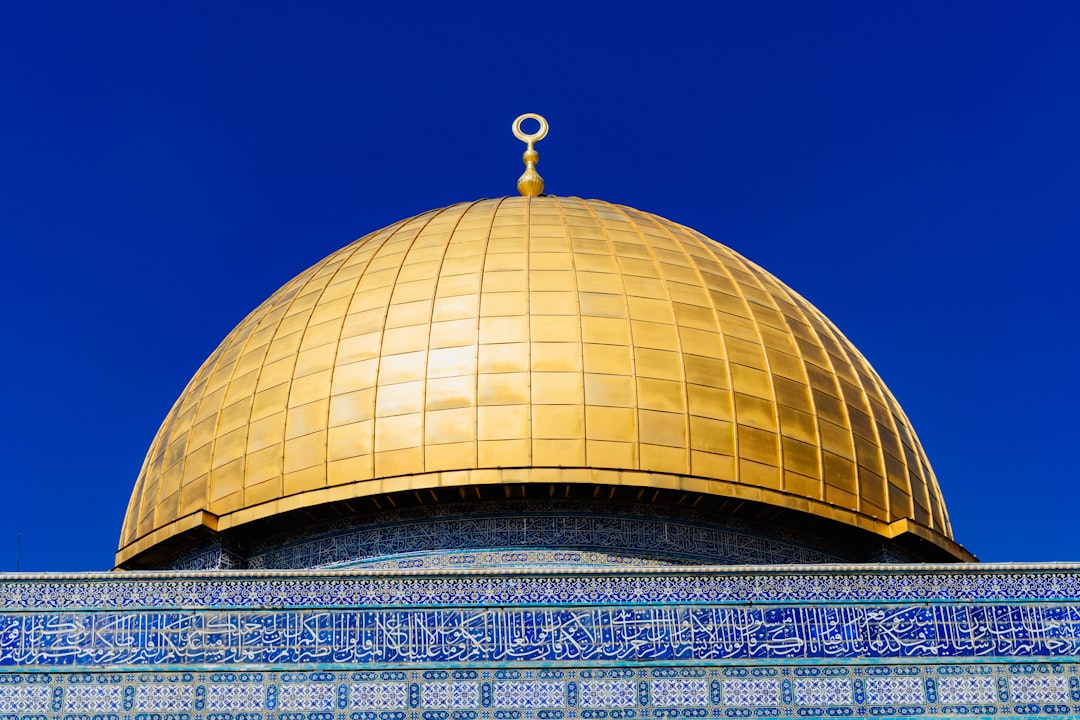 gold dome building under blue sky during daytime