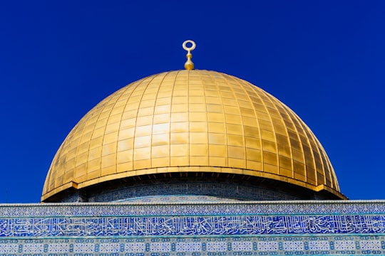 gold dome building under blue sky during daytime in Dome of the Rock Israel