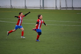 Children celebrating a sports victory, highlighting joy and camaraderie in youth athletics.