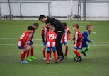 children playing soccer