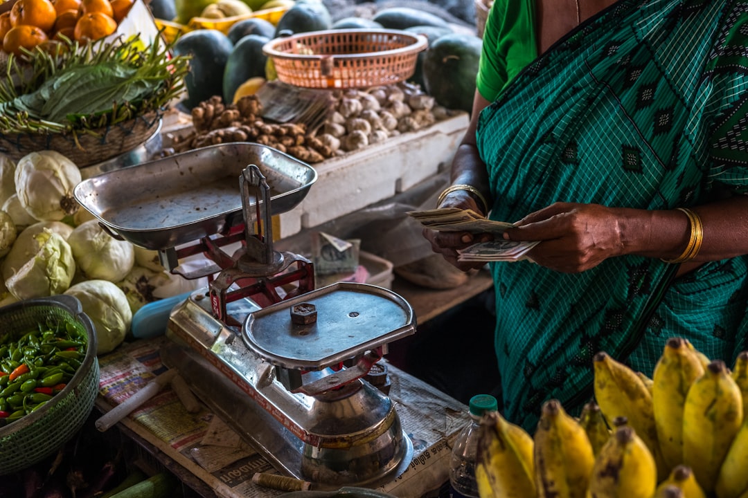 woman in front of stainless steel scale