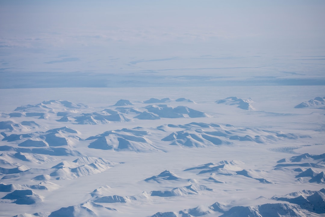 mountain covered by snow, Shot from the air: Spitsbergen