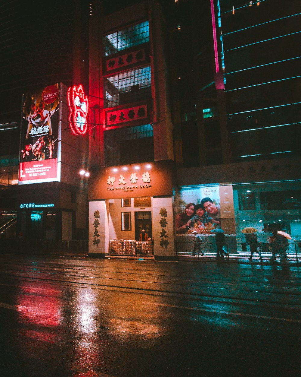 people walking on alley near building