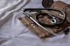 black stethoscope with brown leather case