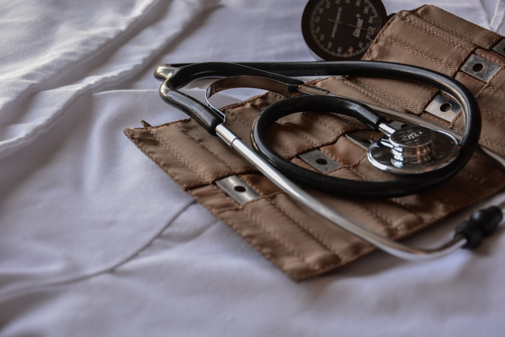 Doctors Bag With Stethoscope On A Gray Background Stock Photo