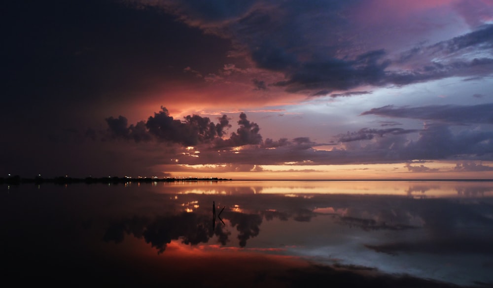 reflective photography of clouds