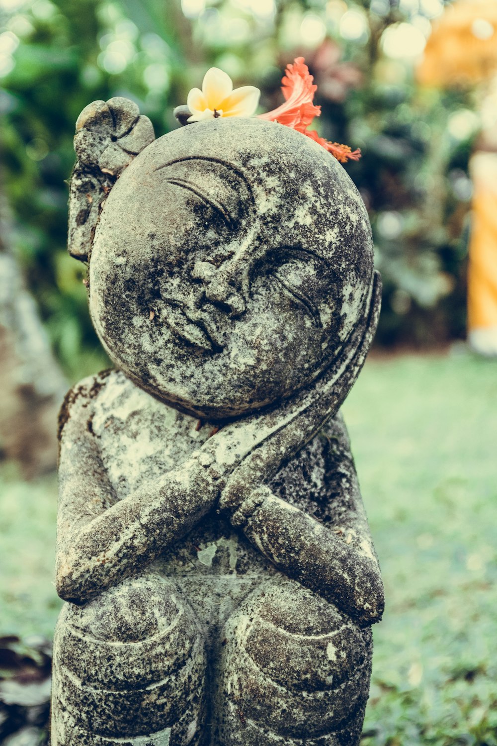 selective focus photography of statue