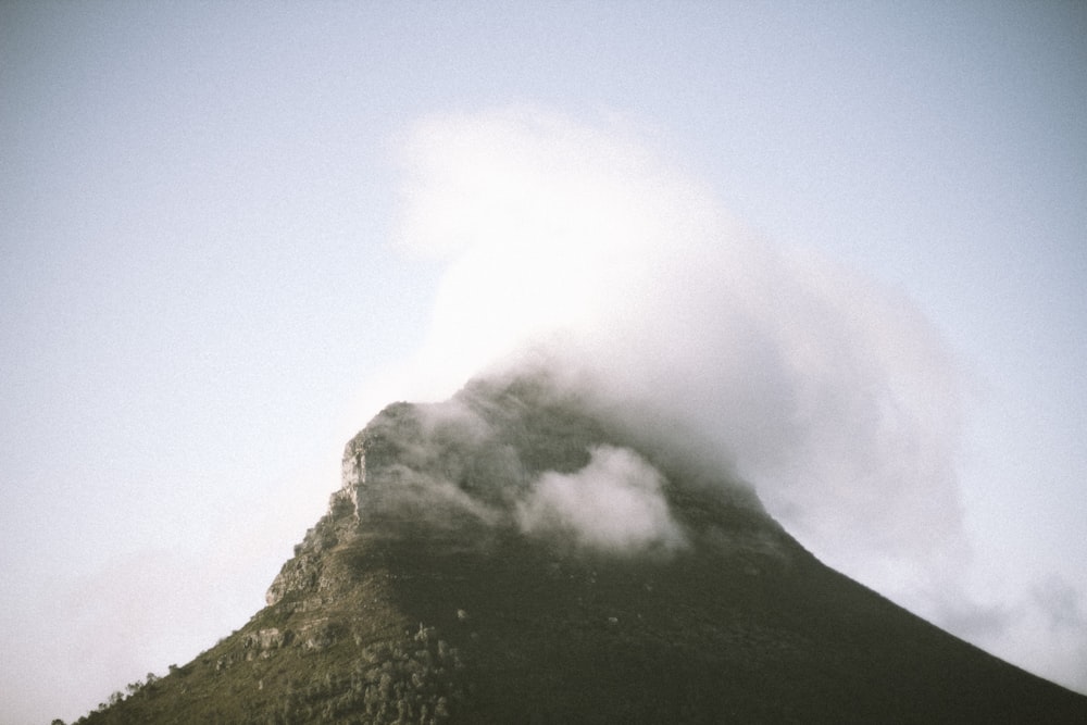 mountain emitting smoke