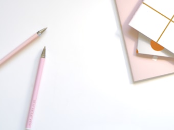 two pen near book