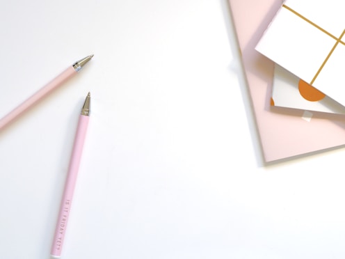 two pen near book