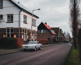 silver car near house