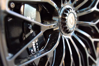 Close-up of a shiny, durable car wheel manufactured by Volparesil on a vehicle.