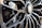 A close-up of stylish car wheels on a sleek vehicle.