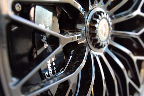 Close-up of a shiny, durable car wheel manufactured by Volparesil on a vehicle.