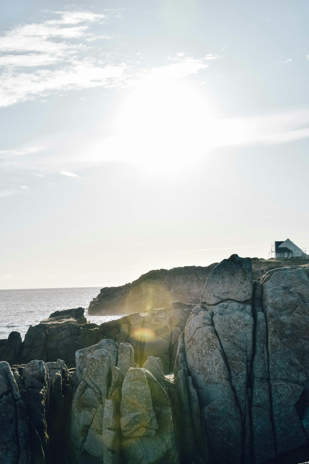 landscape photography of rock formation near beach