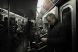 Passengers enjoying a quiet moment while charging their devices.
